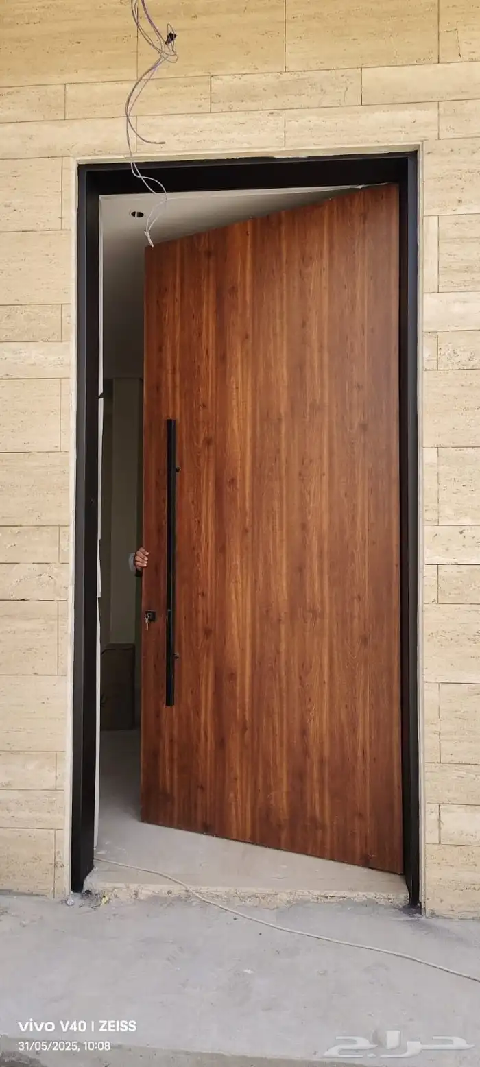 ابواب كلادينج ابواب حديد سواتر مظلات هناجر شبابيك المنيوم 4