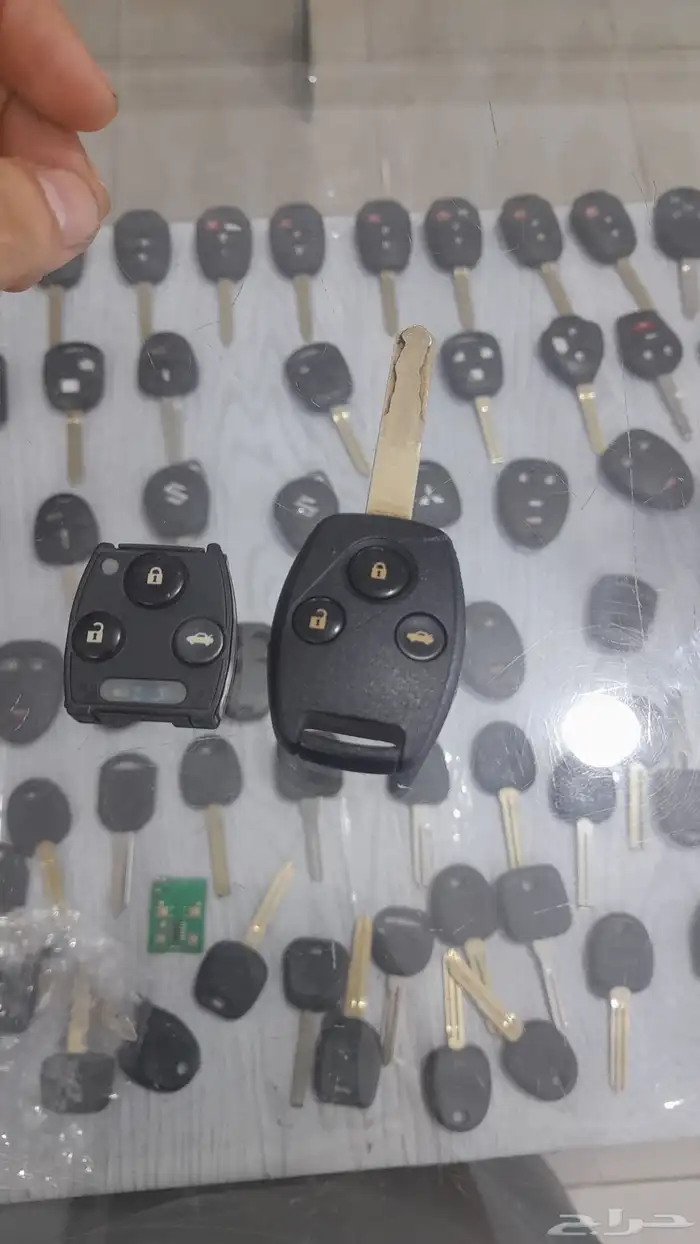 نسخ وبرمجة المفاتيح البصمة والعادي فتح شقق وخزنات تصليح ريمو 1