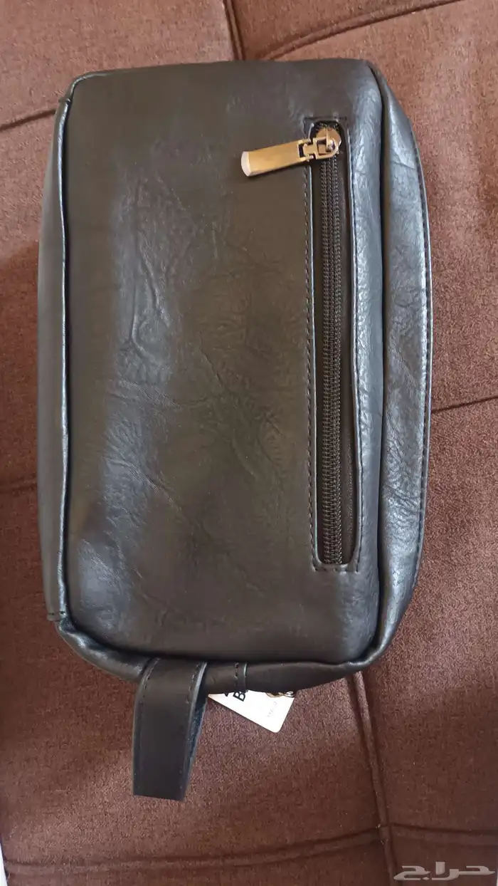 شنطه رجالي صغير ه يدويه جديده غير مستخدمه السعر 100ريال 3