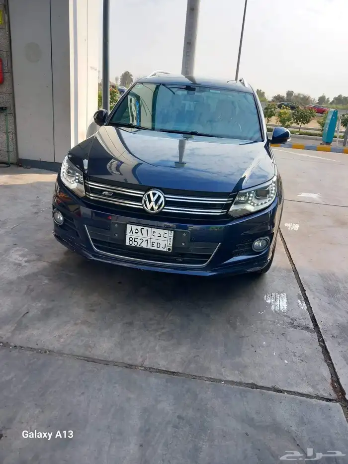 فولكس واجن تيجوان. 2014. مخزن 3