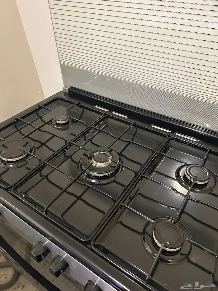 غسالة ملابس وفرن بوتيقاز واسطوانه 1