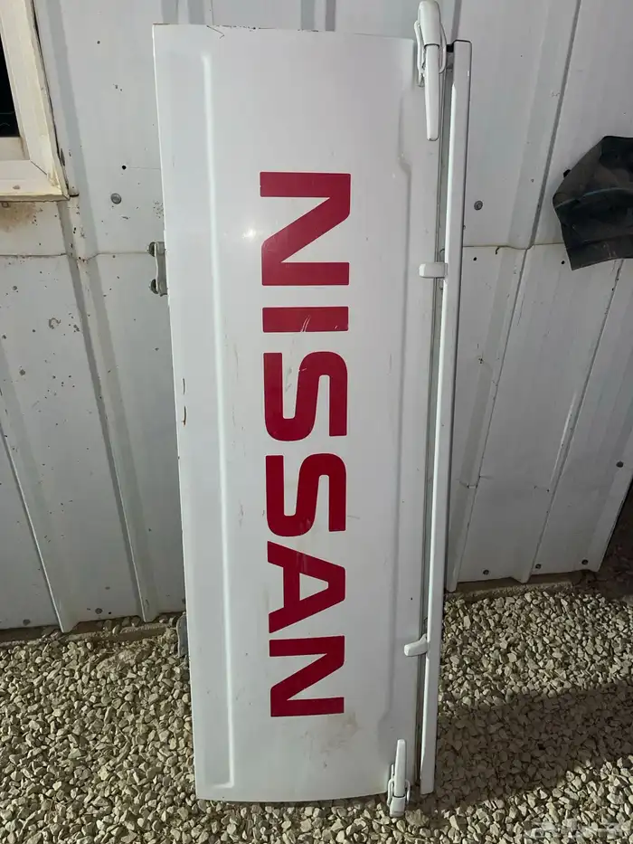 باب صندوق نيسان ددسن 0
