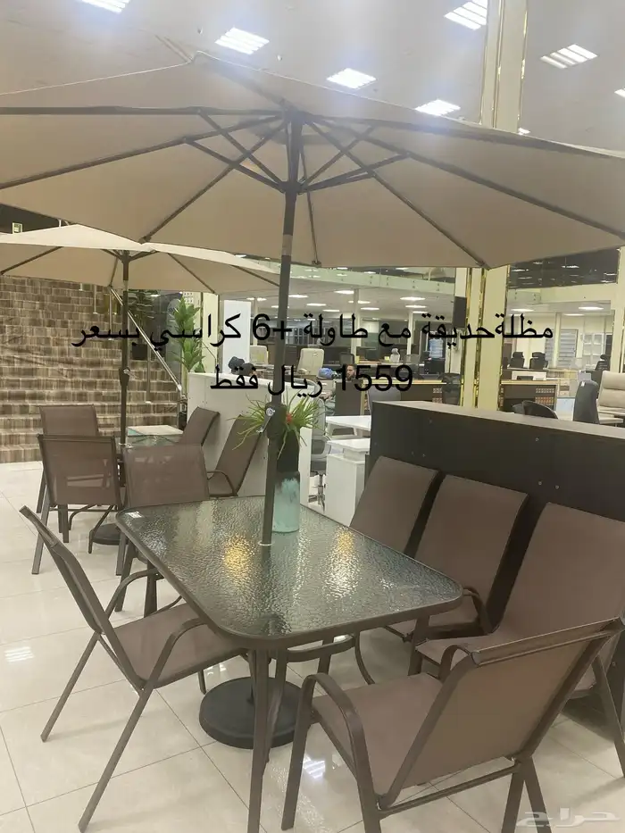 مظلات حدائق بطاوله وكراسي وقاعدة رخام ورمل 3