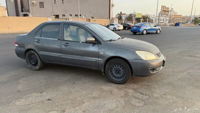 لانسر بومة 2009 2