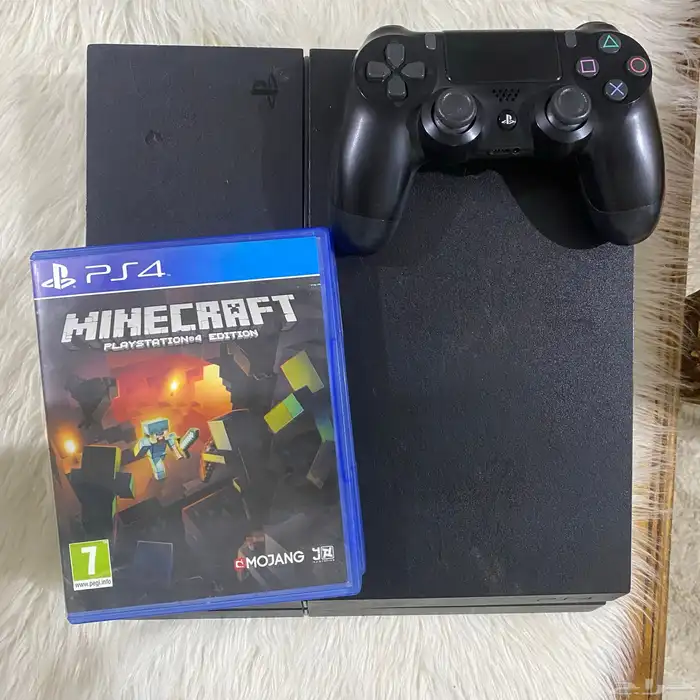 بلاستيشن4 نضيف مع يد وشريطين 2