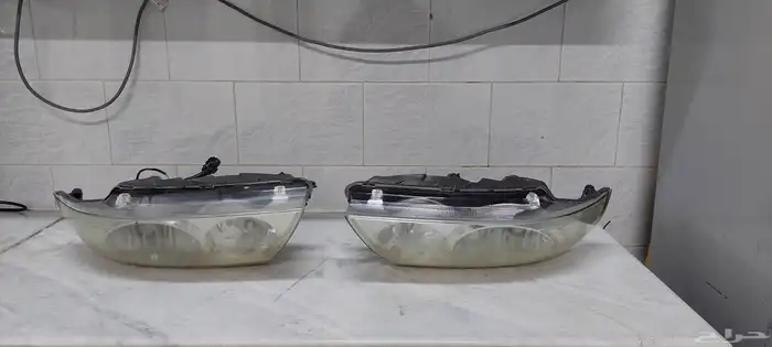 كشافات امامية صني 2011 nissan sunny 2011 head lamp 2