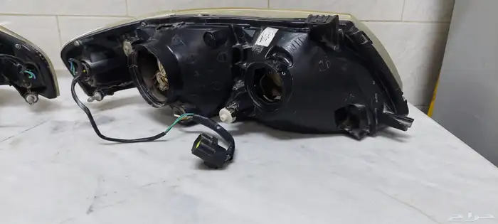 كشافات امامية صني 2011 nissan sunny 2011 head lamp 14