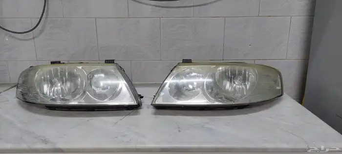 كشافات امامية صني 2011 nissan sunny 2011 head lamp 18