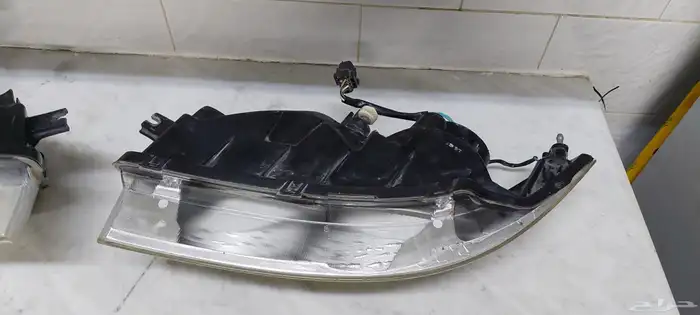 كشافات امامية صني 2011 nissan sunny 2011 head lamp 7