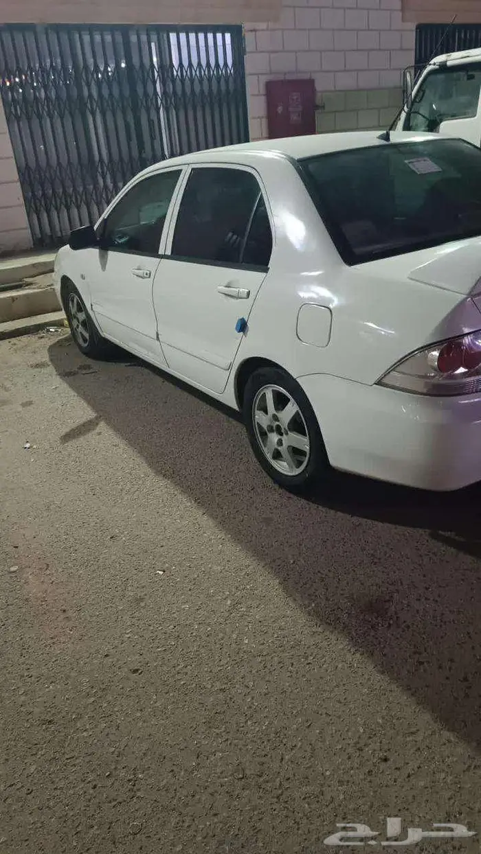 لانسر 2009 للبيع 4