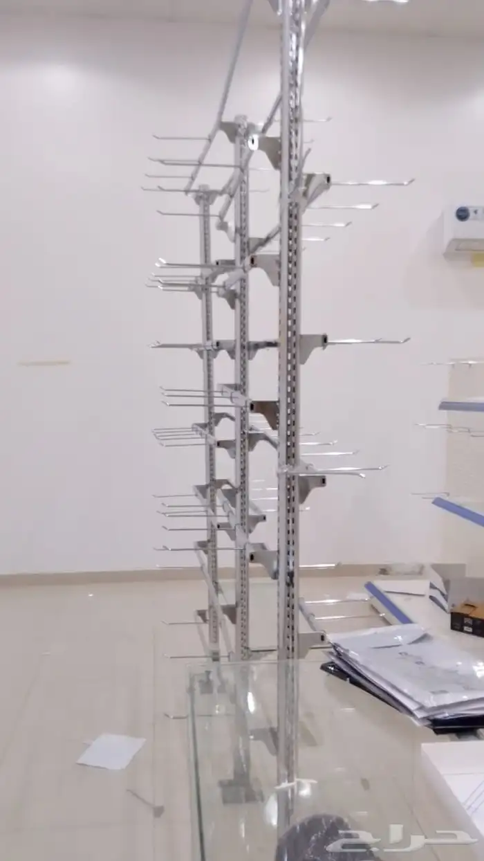 رفوف بقاله جداري 16متر وسط 12متر العرض 45سم 1