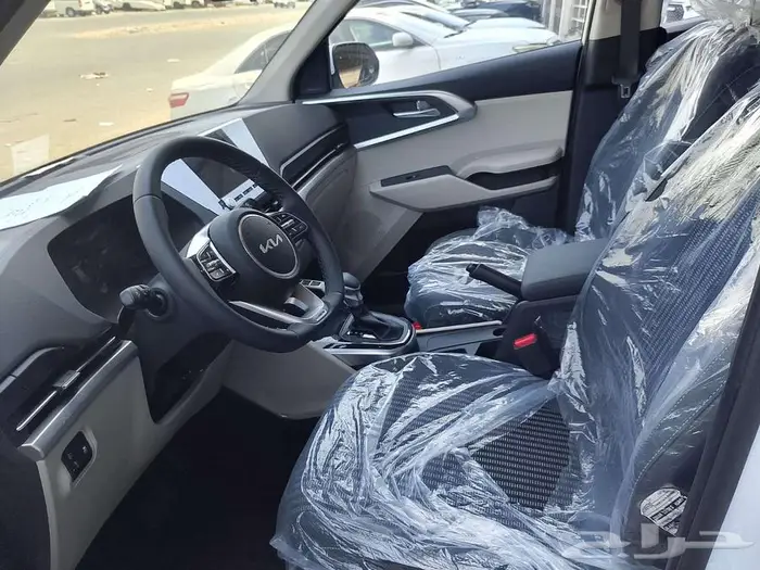 كيا كارينز GLS 2025 طاولة طعام شرائح زينون الارخص في المملكة 5