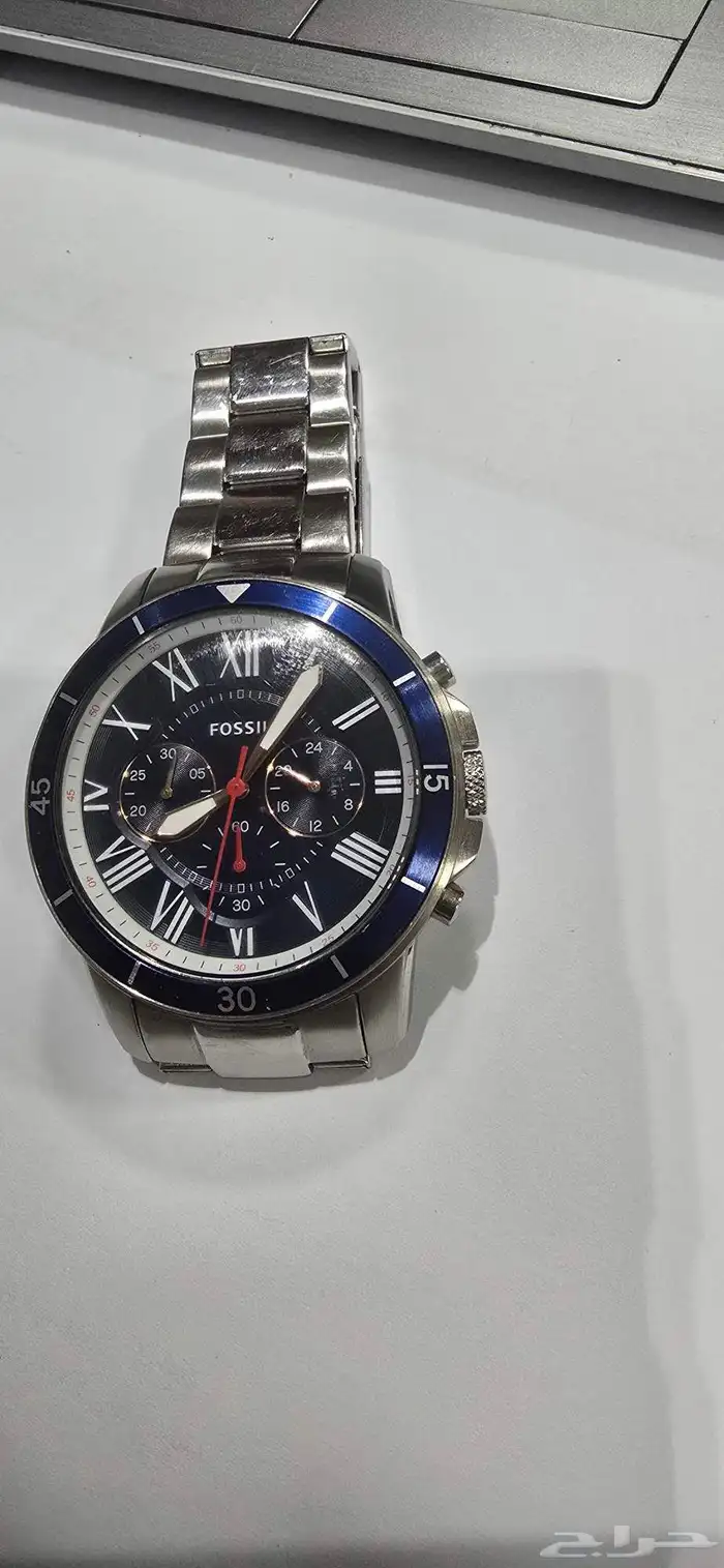 ساعه فوسيل شبة جديده 1