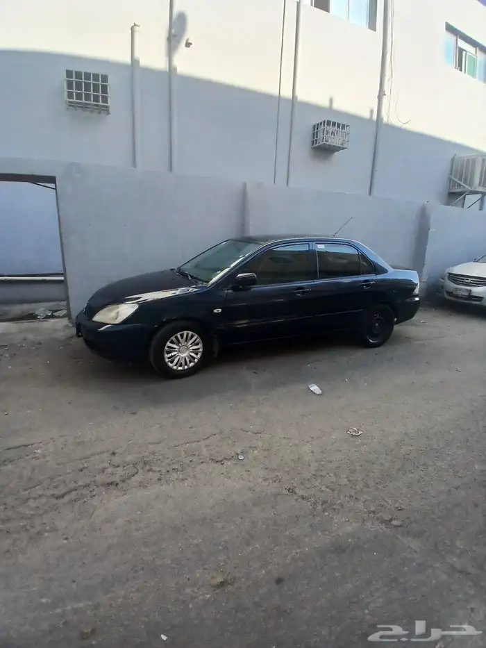 للبيع سيارة مستوبيشي لانسر موديل 2009 مفحوص مجدد استمارة سار 2