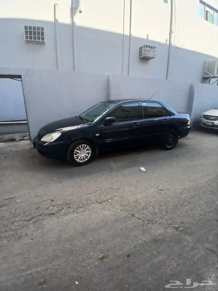 للبيع سيارة مستوبيشي لانسر موديل 2009 مفحوص مجدد استمارة سار 1