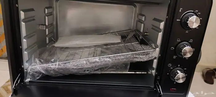 ميكرويف جديد بالكرتون بكامل أغراضه لم يستخدم 1