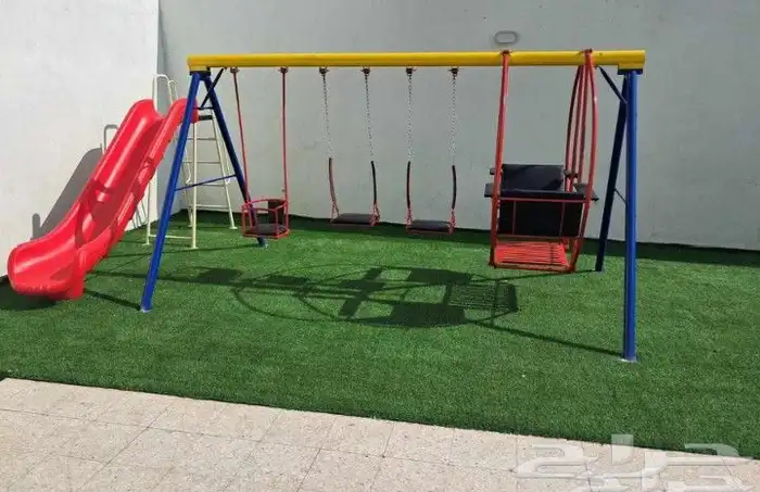 في مرجيحه. . زحليقه دواره كراسي حديد خشب كله في . ا 2