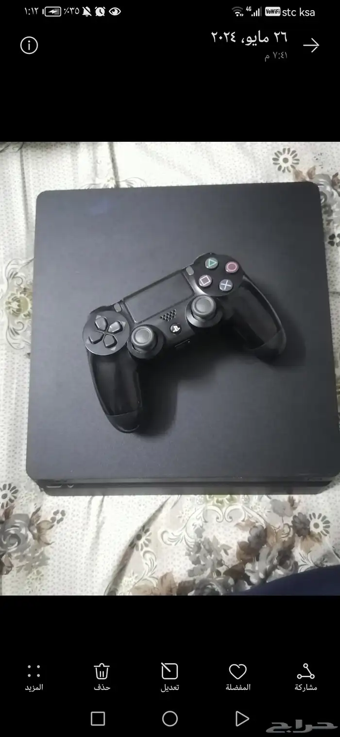 بلاستيشن 4 وان تيرا مع اليد وشاحن الأصلي والاسلاكه حقه و قرا 0