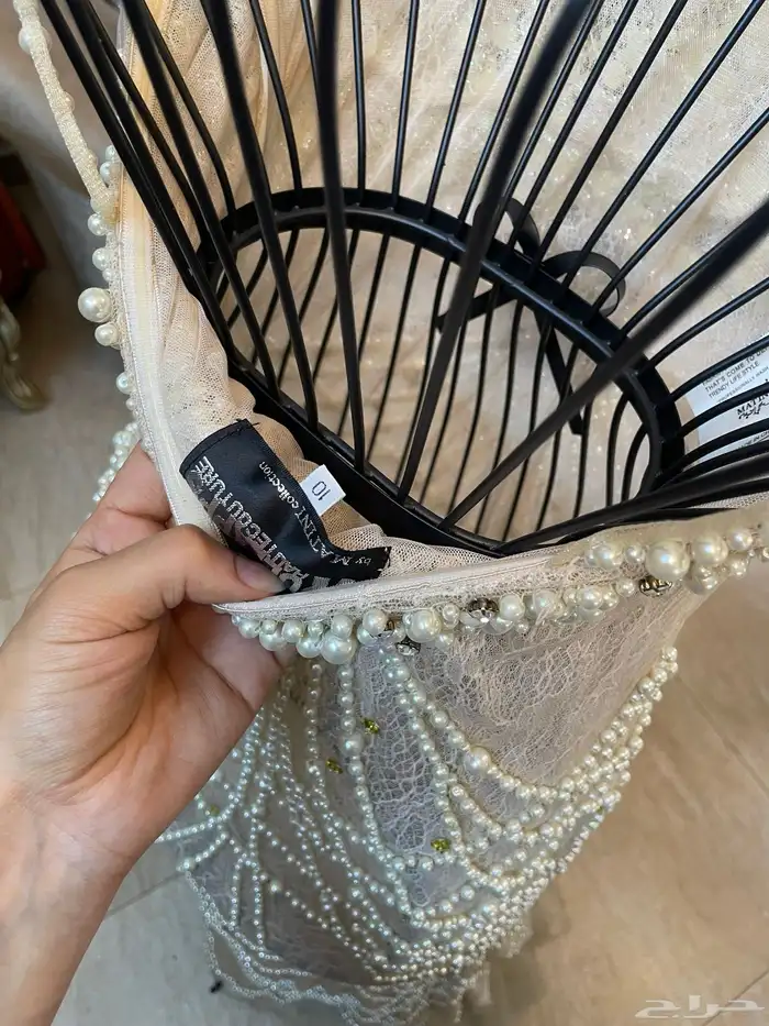 فستان ملكي لون اوف وايت وبطانة بيج فاتح مشكوك لولو كامل فخم 2