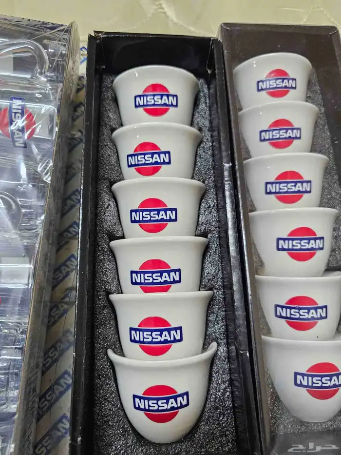 فناجيل شاهي وقهوة بشعار نيسان وداتسون 0