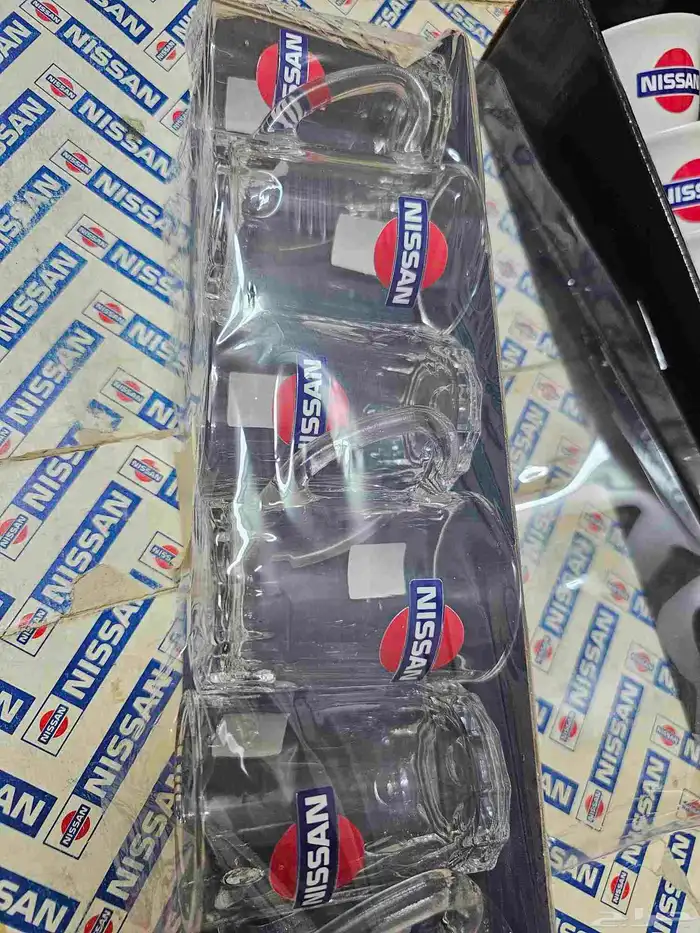 فناجيل شاهي وقهوة بشعار نيسان وداتسون 2