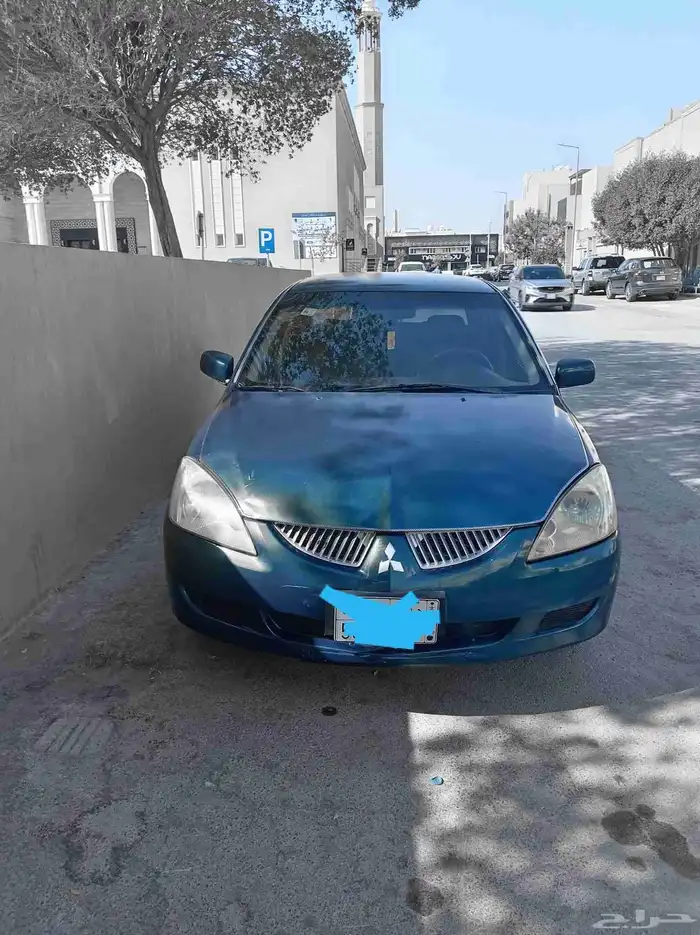 لانسر بومه موديل 2006 استمارة 3 سنوات فحص جديد سنه مكينه جير 0