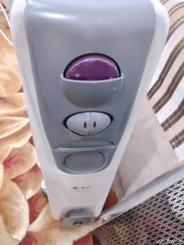 للبيع غساله و2دفايات زيت شغالات فل 3