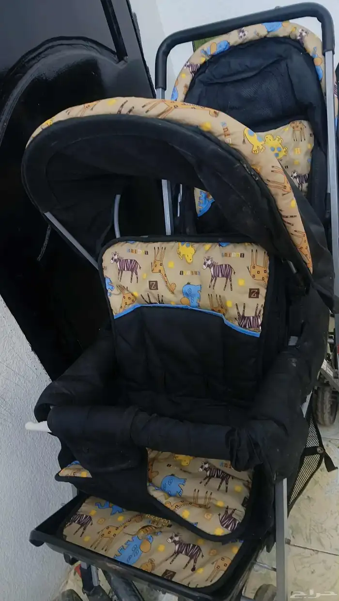 عربة أطفال توأم 0