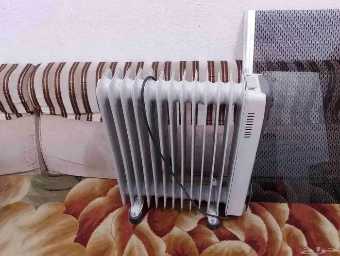 للبيع غساله و2دفايات زيت شغالات فل 2