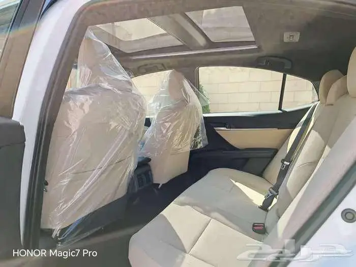 كامرى هايبرد LE ابيض 2025 2