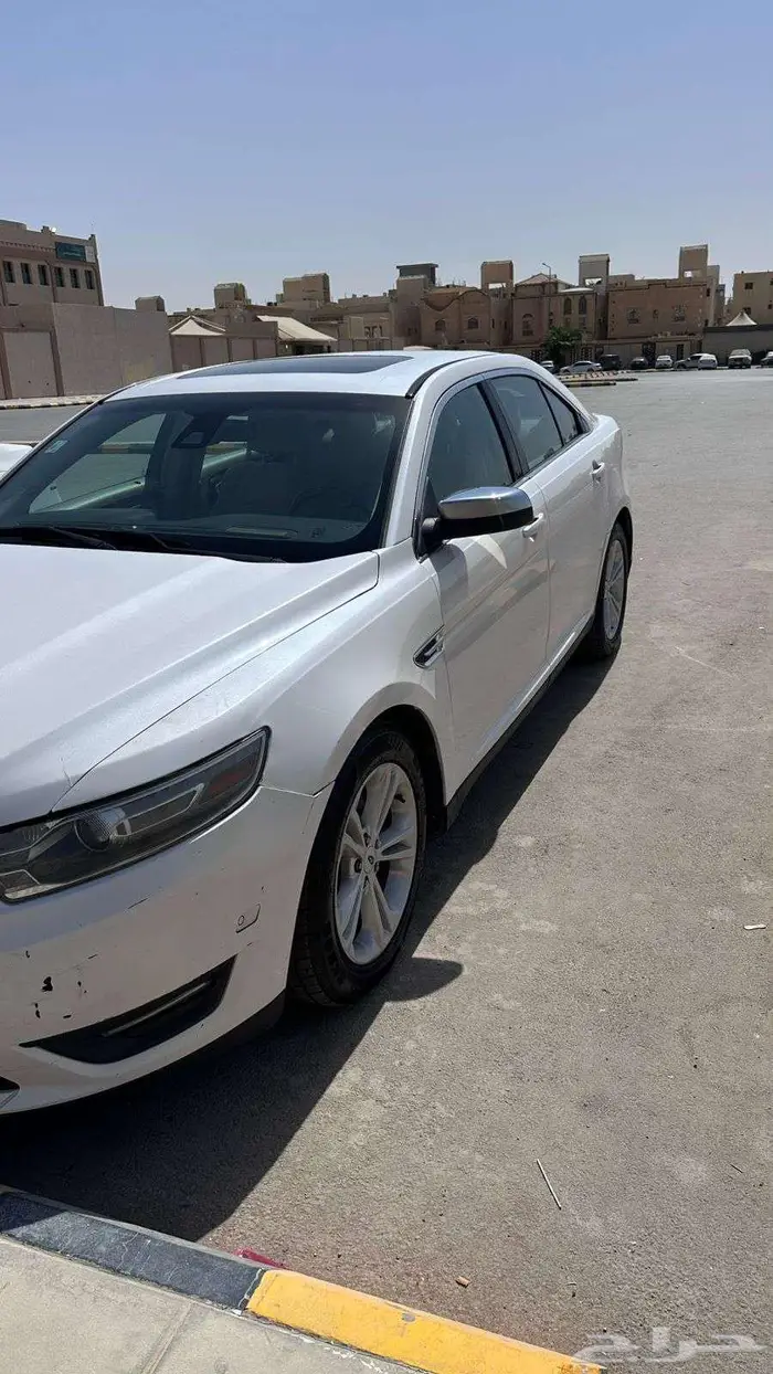 فورد تورس موديل 2014 اللون الابيض 1