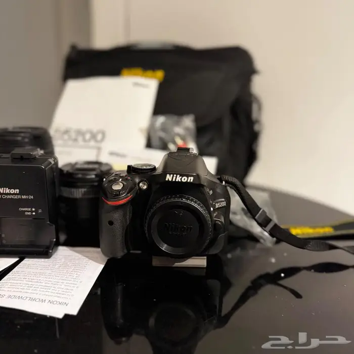 كاميرا نيكون D5200 مع استاند بحالة ممتازه 1