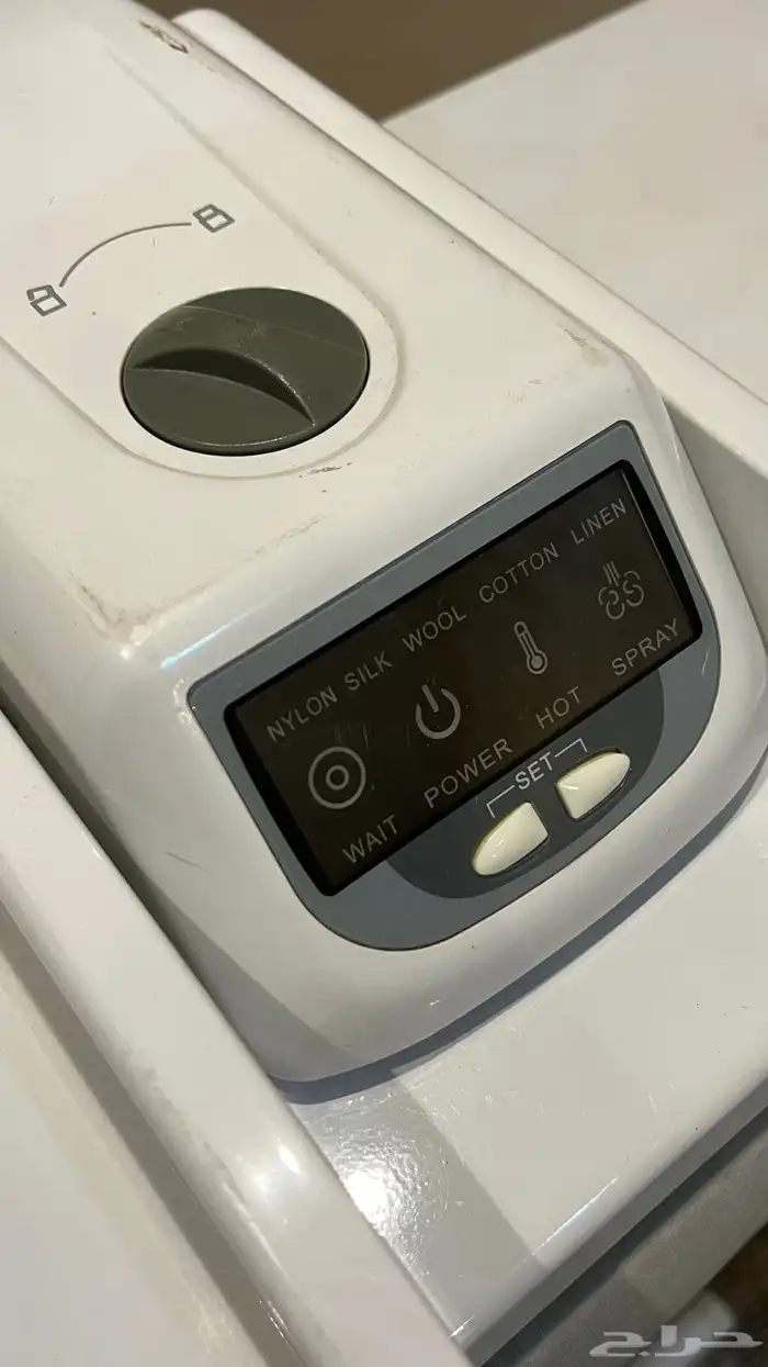 مكواة بخار مع قاعدة 1