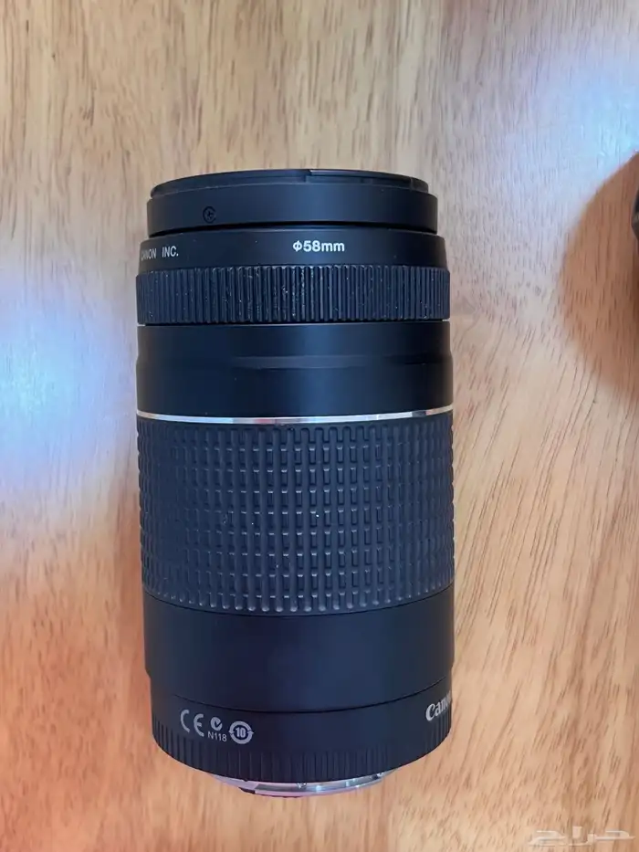 كاميرا كانون مع عدساتها وستاند 3