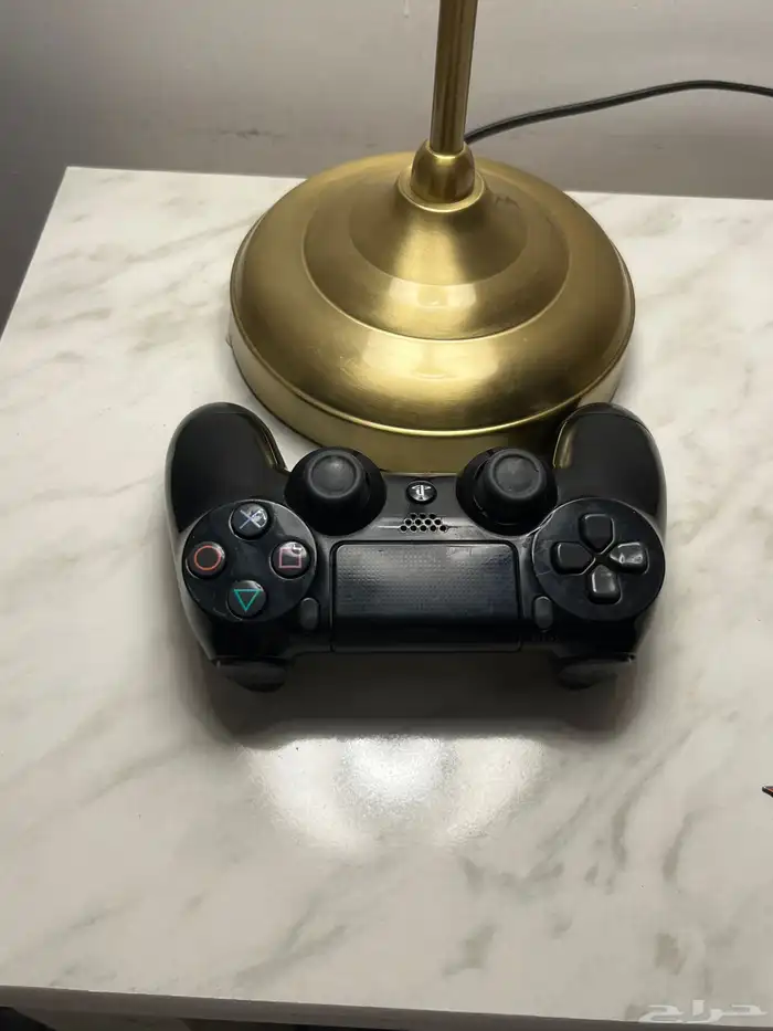 سوني 4مفكوك كل شي سليم واليد اصليه مع الشريط على السوم 1