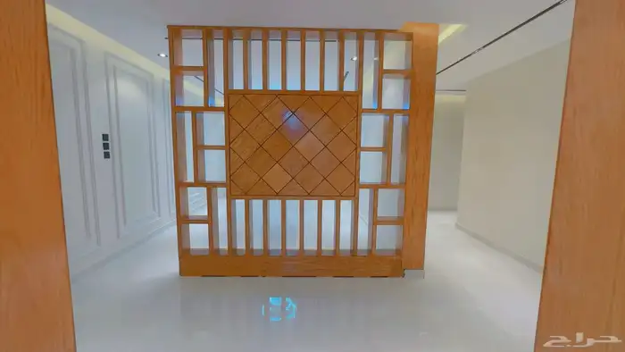 دور ارضي للبيع 6 غرف وصاله ومشب بحي البوادي 13