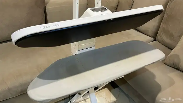 مكواة بخار مع قاعدة 0