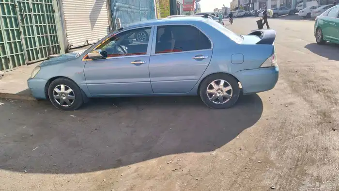 ---   للبيع  ميتسوبيشي لانسر 2006 أوتوماتيك   سيارة عملية 1