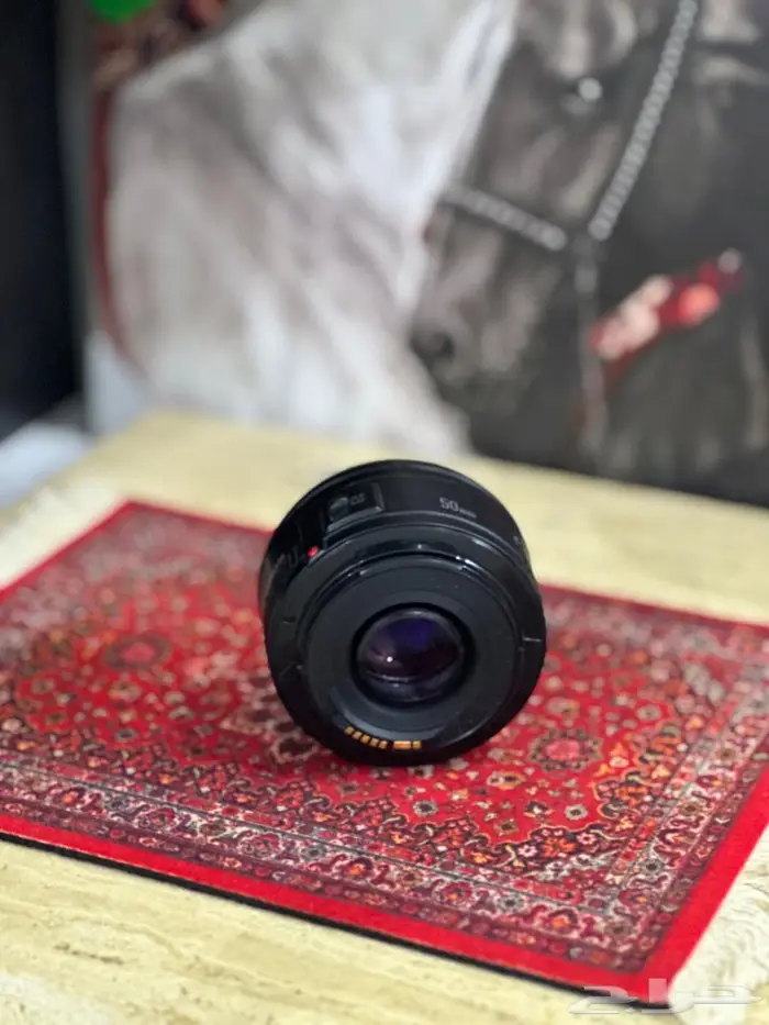 عدسة كانون 0