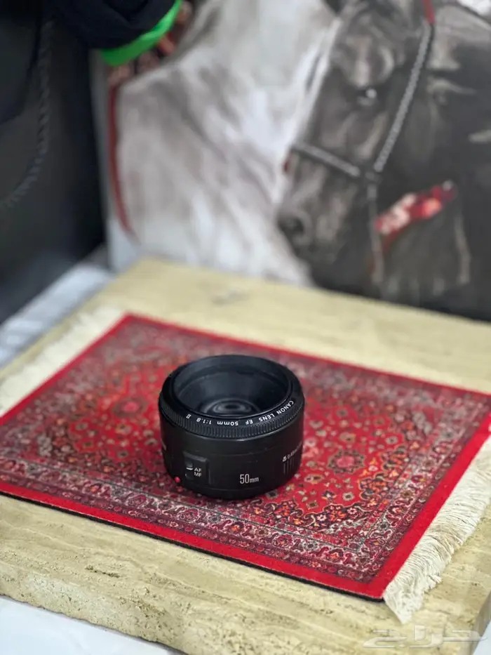 عدسة كانون 1