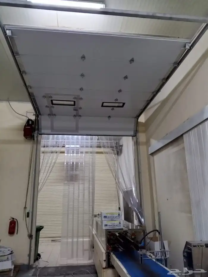 أبواب متحركة أبواب أتوماتيكية أبواب كراجات أبواب محلات أبواب 11