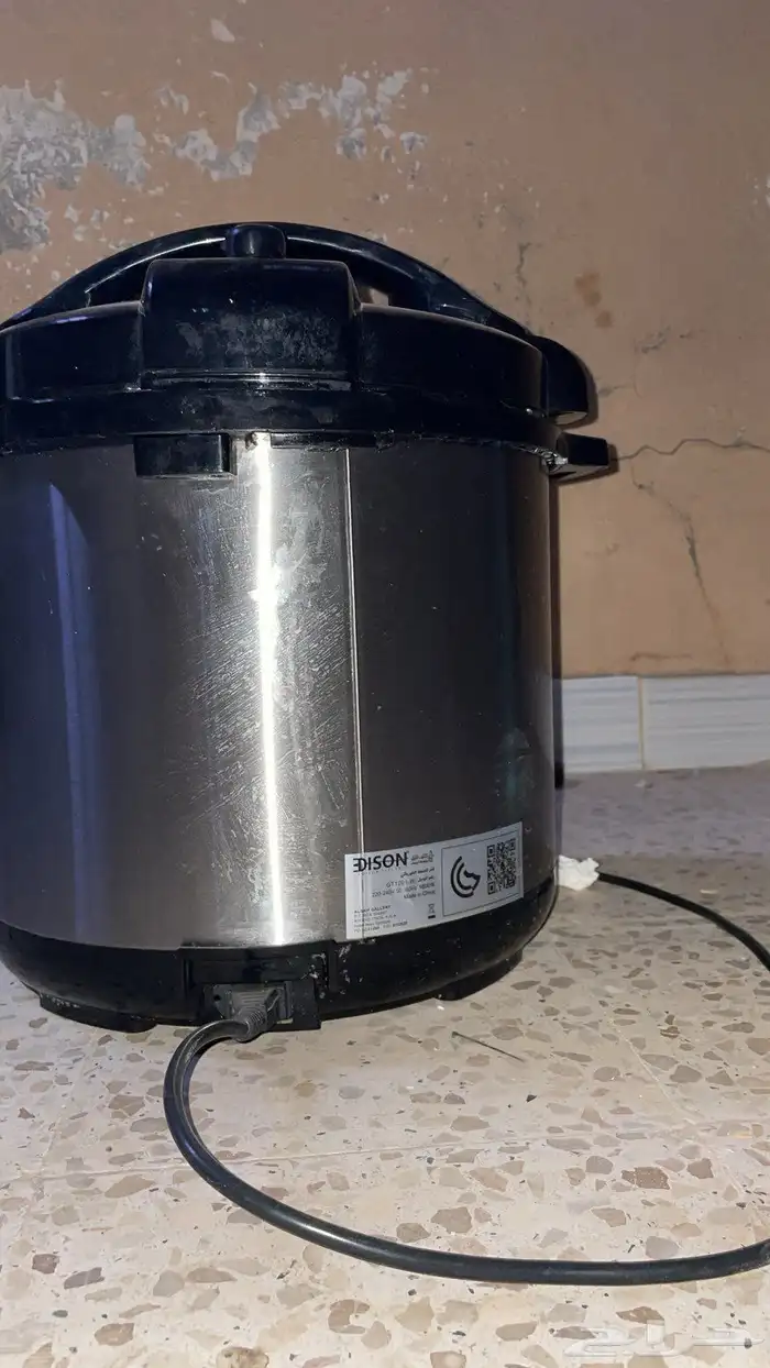 ضغط كهربائي شغال نظيف ما في شيء غير الغطاء مكسور 3