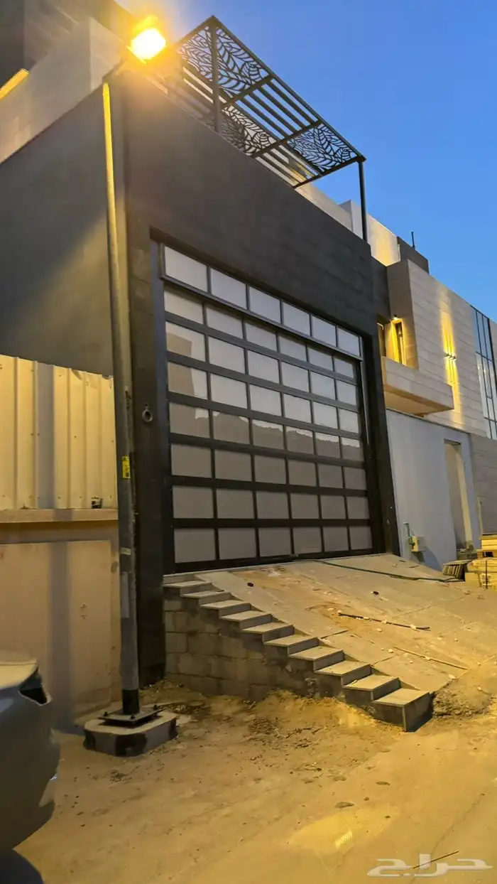 أبواب متحركة أبواب أتوماتيكية أبواب كراجات أبواب محلات أبواب 12
