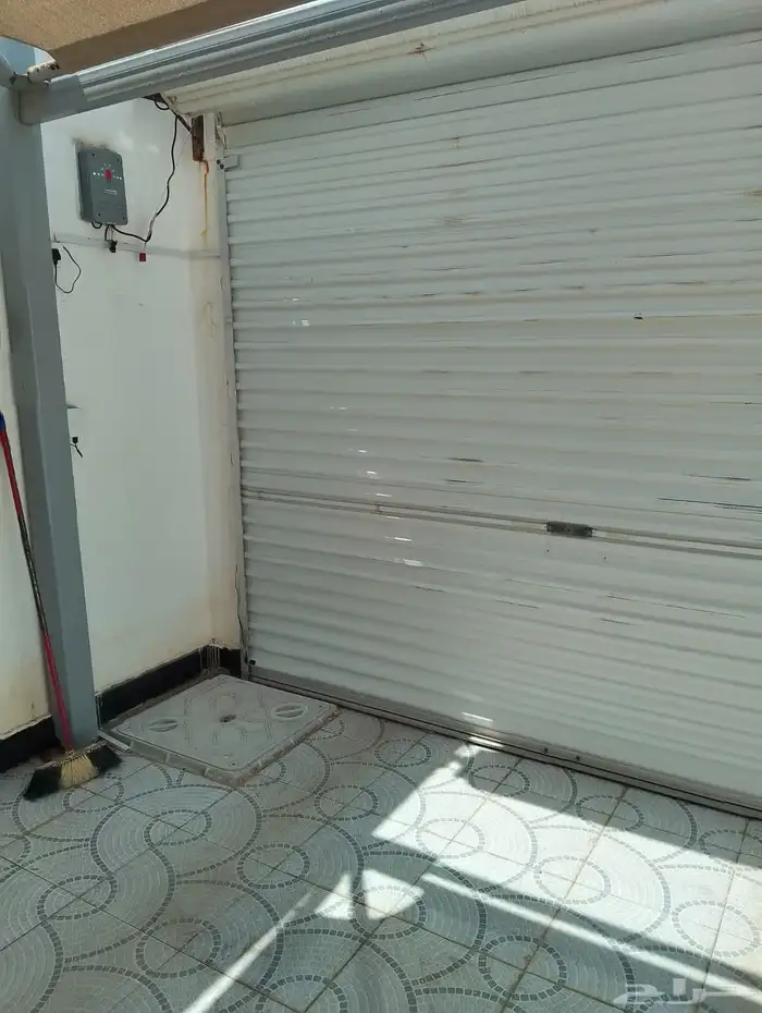 فني صيانة أبواب الكهرباء تركيب باب الجرا 4