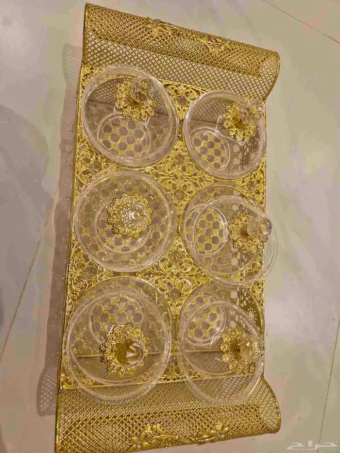 تبسي حلويات ذهبي بكريستالات 0