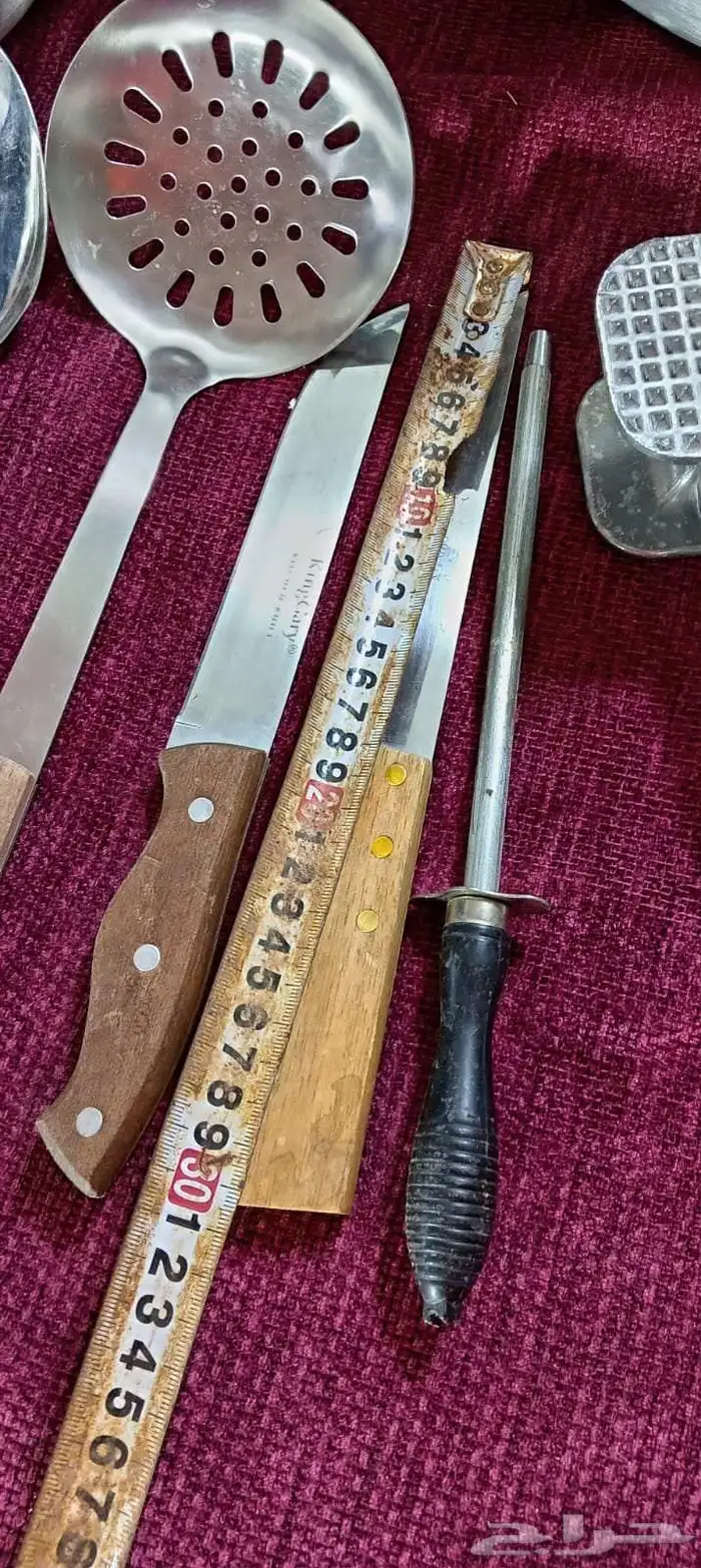 قدور معدن مع مغارف 9