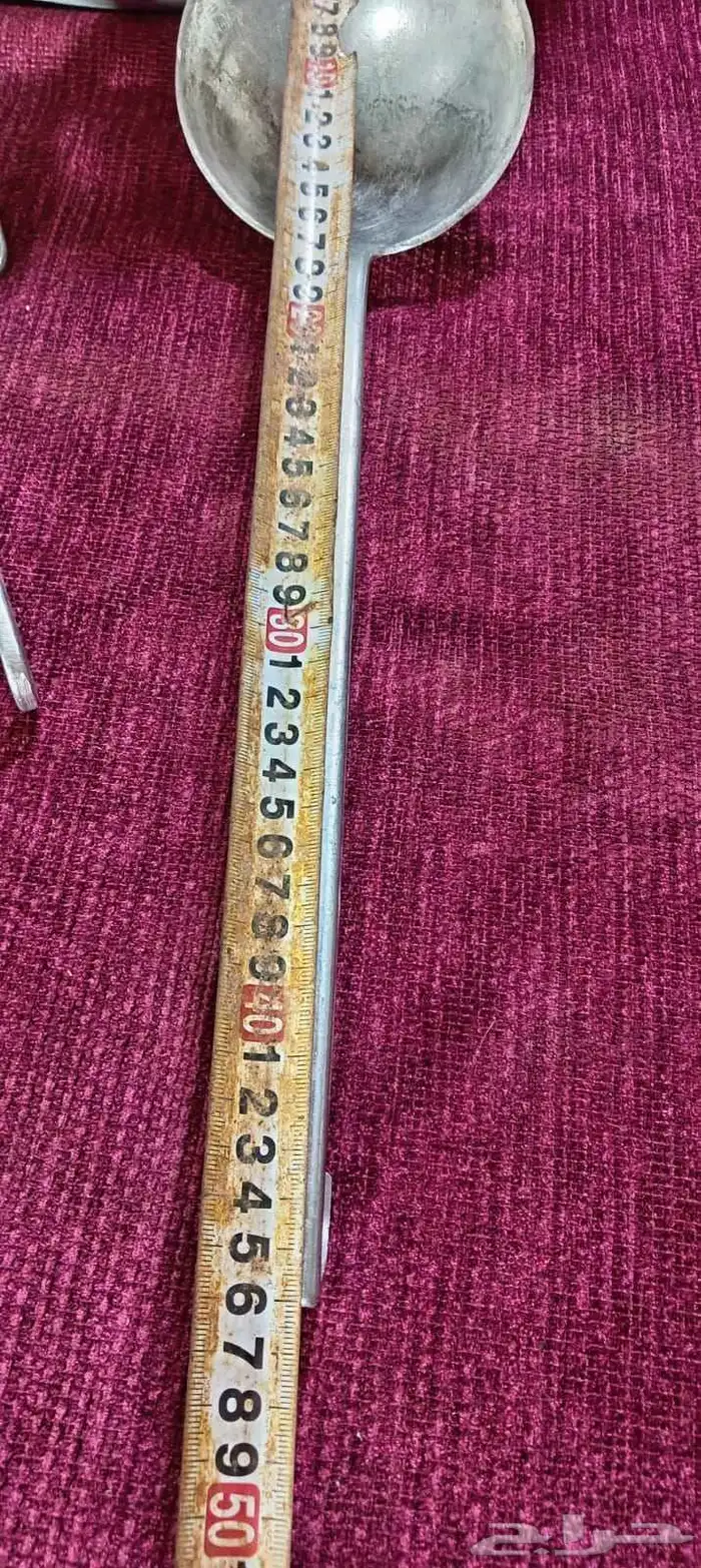 قدور معدن مع مغارف 8