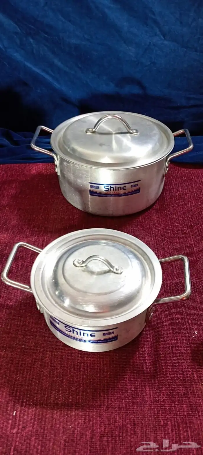 قدور معدن مع مغارف 15