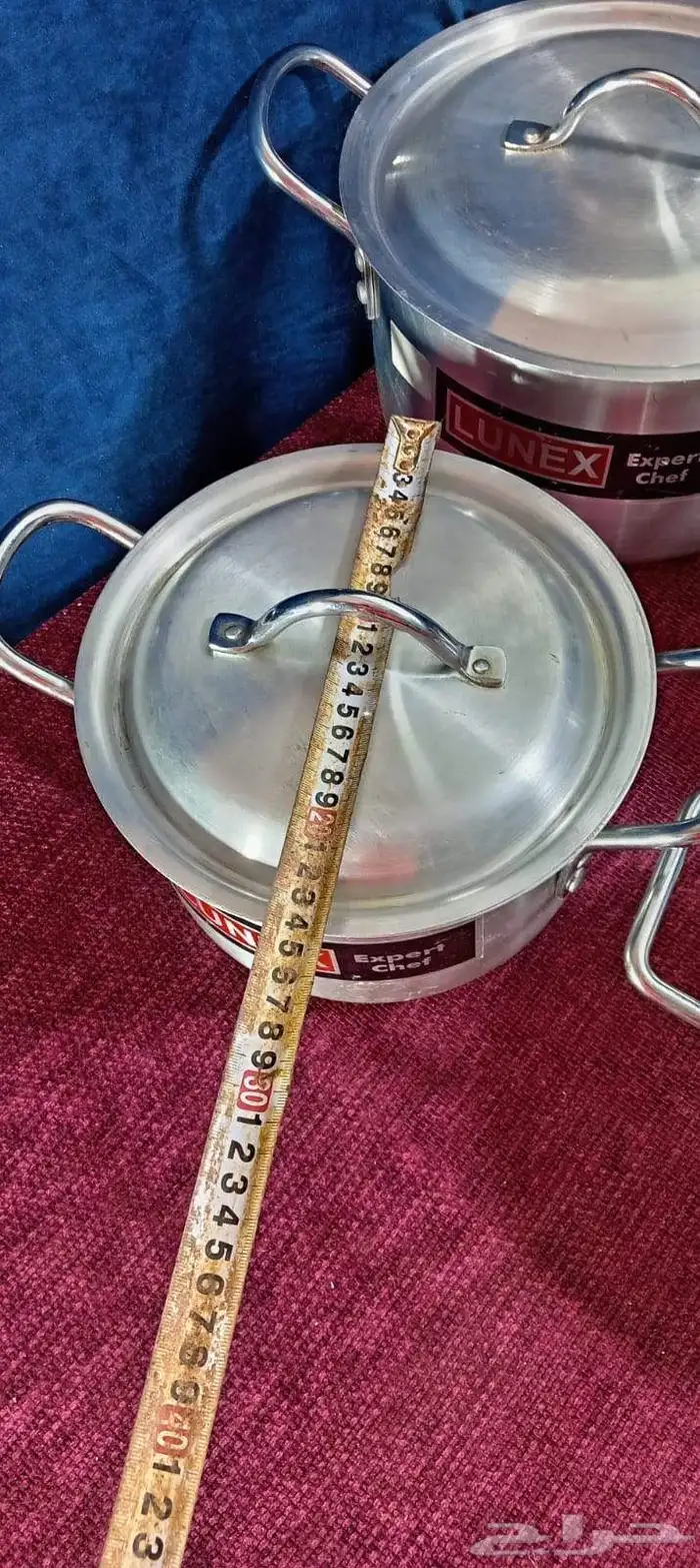 قدور معدن مع مغارف 14