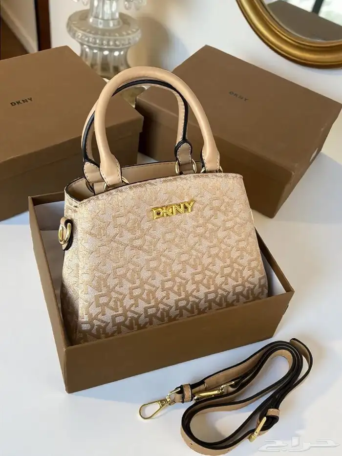 متجر_كاتشي شنطة كتف من دكني بلون المشمش وتصميم عصري. 4